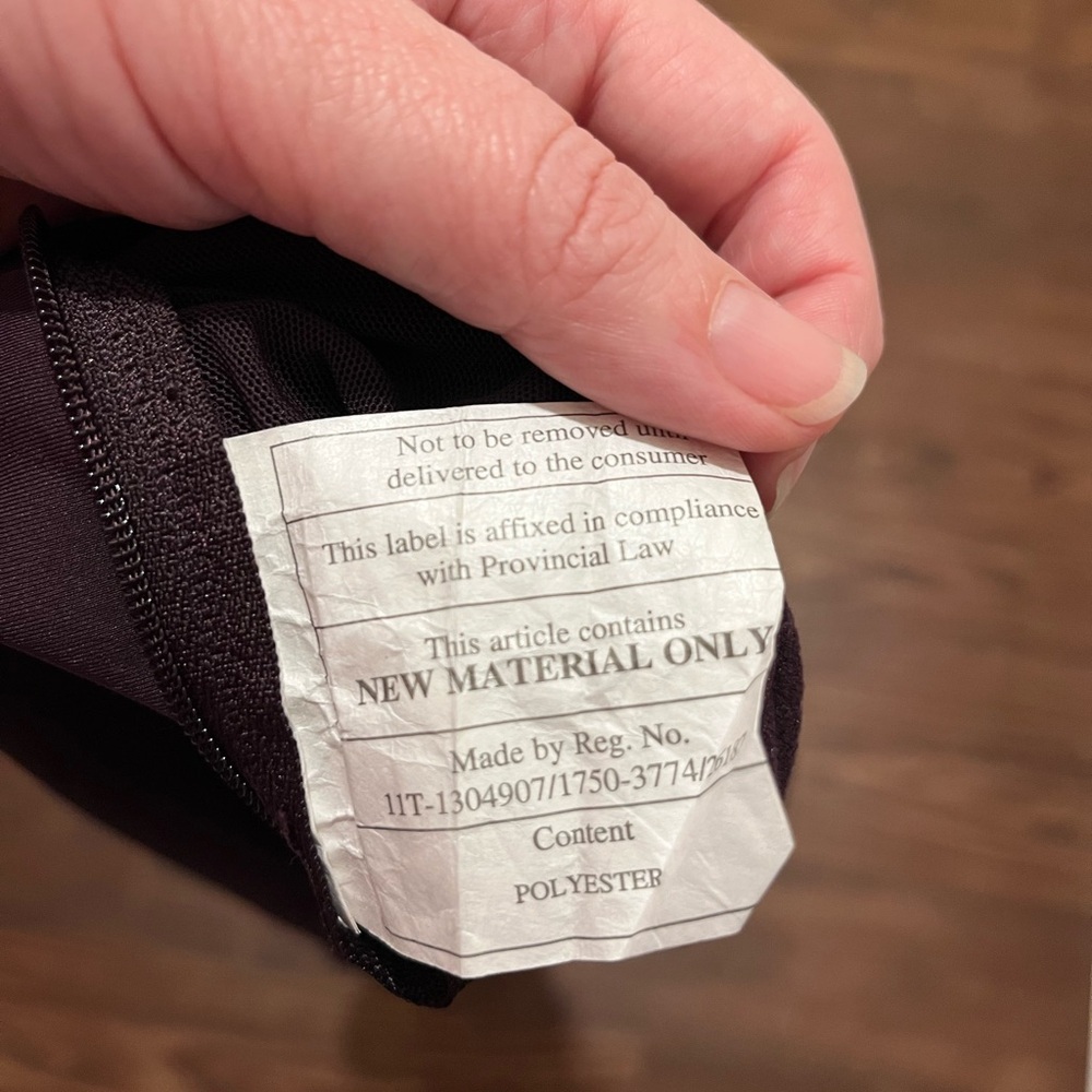 Lululemon Fast As Fleece Tight
Black Cherry Womens Size 4
Reflective Pocket - Picture 12 of 14